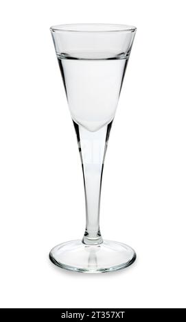 Gin or vodka or grappa in a goblet shot glass isolated on white with clipping path included Stock Photo