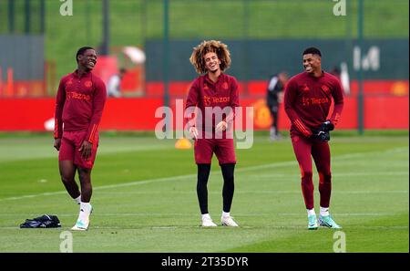 Manchester United's Kobbie Mainoo, Hannibal Mejbri and Marcus Rashford (left-right) during a training session at the Trafford Training Centre in Carrington, Greater Manchester. Picture date: Monday October 23, 2023. Stock Photo