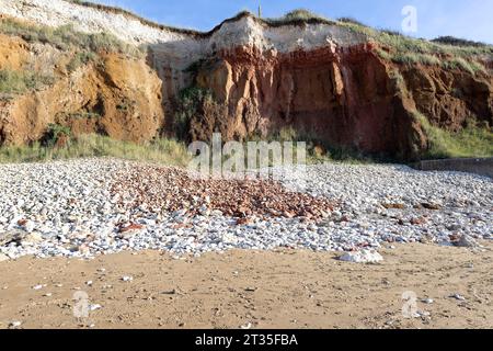 Red and white striped cliffs (carstone and chalk ) at hunstanton, norfolk Stock Photo