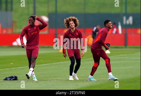 Manchester United's Kobbie Mainoo, Hannibal Mejbri and Marcus Rashford (left-right) during a training session at the Trafford Training Centre in Carrington, Greater Manchester. Picture date: Monday October 23, 2023. Stock Photo