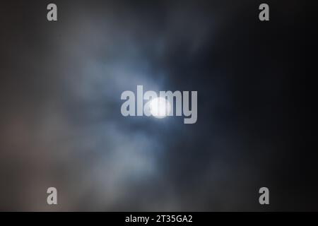 Meppen, Germany. 23rd Oct, 2023. The sun peeks through a gap in the clouds in the sky. Credit: Friso Gentsch/dpa/Alamy Live News Stock Photo