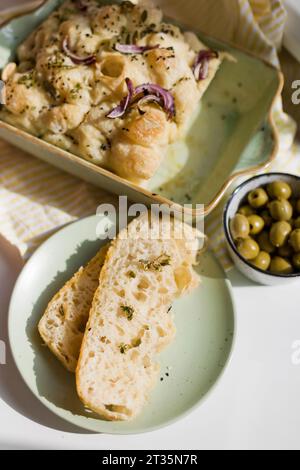 Freshly baked Focaccia bread with onion and black sesame seeds Stock Photo