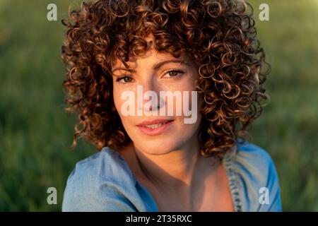 beautiful woman with curly hair Stock Photo - Alamy