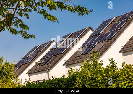 Germany, Baden-Wurttemberg, Solar panels on roofs of modern suburban houses Stock Photo