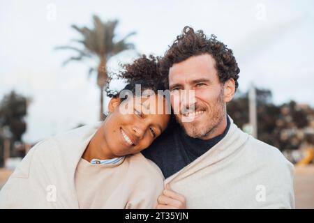 Loving couple spending leisure time together at beach Stock Photo