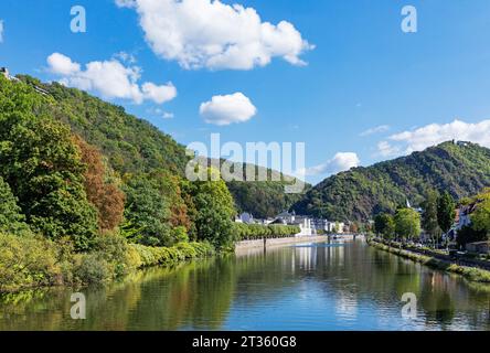 Germany, Rhineland-Palatinate, Bad Ems, View of Lahn river surrounded by forested hills in summer Stock Photo