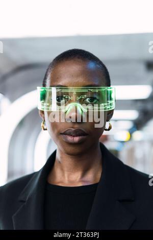 Young woman wearing smart glasses Stock Photo
