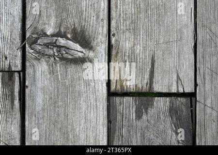Retro style vintage wooden background from damp boards top view outdoors close-up Stock Photo