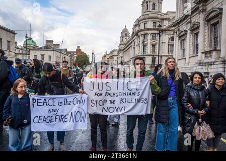 Protestors in the Whitehall, Pro-Palestinian protest in Central London on 21/10/2023, England, UK Stock Photo