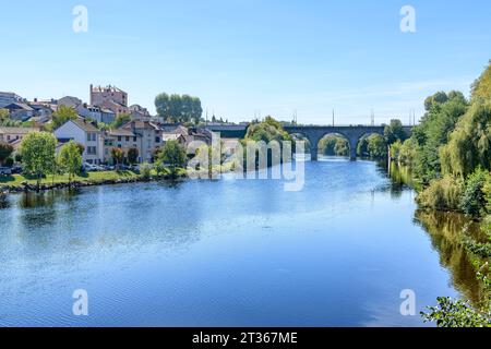 The view south from Pont Saint-Étienne bridge in Limoges France. With houses along the river Vienne and Pont Neuf can be seen in the distance. Stock Photo