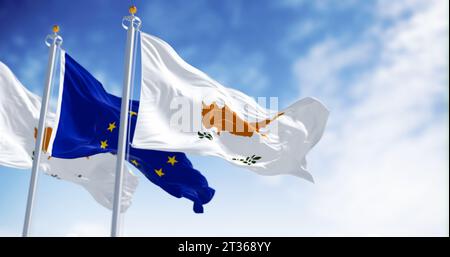 Cyprus national flag waving in the wind with the European Union flag on a clear day. 3d illustration render. Fluttering fabric. Stock Photo