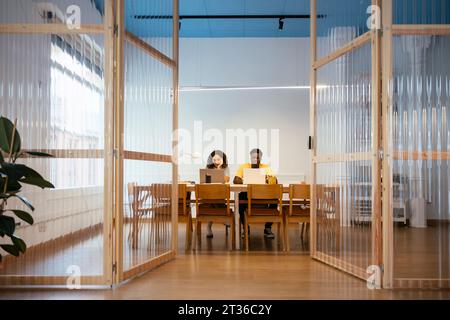 Young students studying and using laptop at university Stock Photo