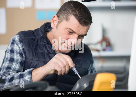 male technician doing meter reading Stock Photo