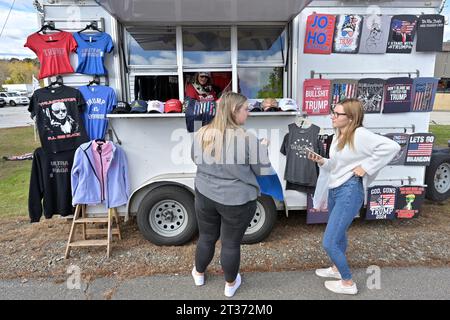 Derry, USA. 23rd Oct, 2023. Supporters shop for merchandise outside a Donald Trump campaign event in Derry, New Hampshire. on Monday, October 23, 2023. (Photo by Josh Reynolds/Sipa USA) Credit: Sipa USA/Alamy Live News Stock Photo