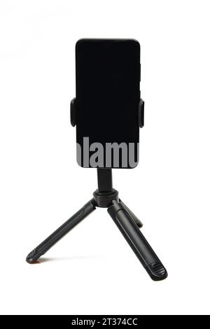 Smartphone on tripod stand isolated on white background Stock Photo