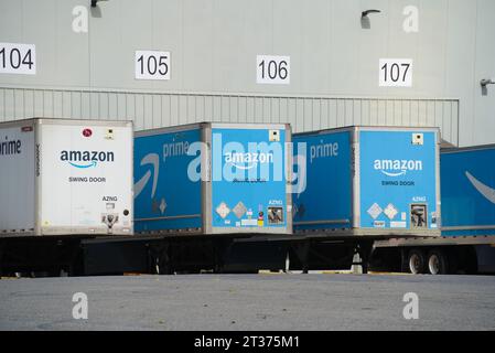 Bronx, NY - October 22, 2023: Loading docks with trailers at Amazon fulfillment center warehouse facility Stock Photo