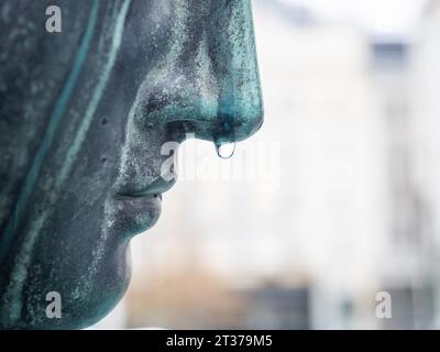 Raindrops on the nose of a fountain figure, detail of the Donnerbrunnen, created by Georg Raphael Donner 1739, largest Viennese fountain, Neuer Stock Photo