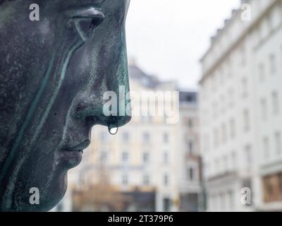 Raindrops on the nose of a fountain figure, detail of the Donnerbrunnen, created by Georg Raphael Donner 1739, largest Viennese fountain, Neuer Stock Photo