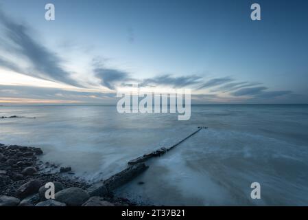 Dawn on Hovmarken Beach, Breakwater, Baltic Sea Island Mon, Denmark Stock Photo