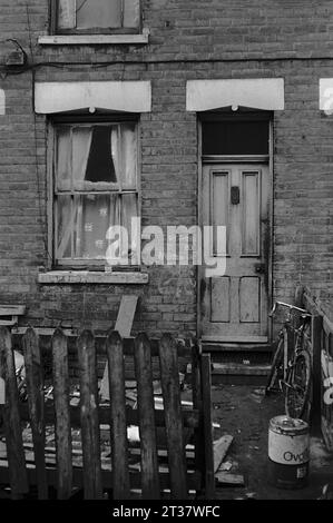A house still being lived in amongst a row of Victorian terraced houses awaiting demolition during the slum clearance of St Ann's, Nottingham. 1969-72 Stock Photo