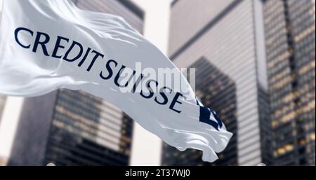 Zurich, CH, March 2023: Credit Suisse flag fluttering in the wind in a financial district. In March 2023, UBS bought Credit Suisse. Illustrative edito Stock Photo