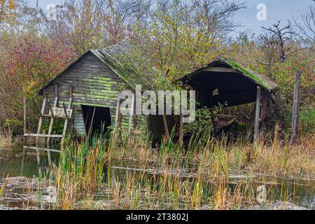 A derelict cabin and boathouse in Finn Slough Richmond British Columbia Canada Stock Photo