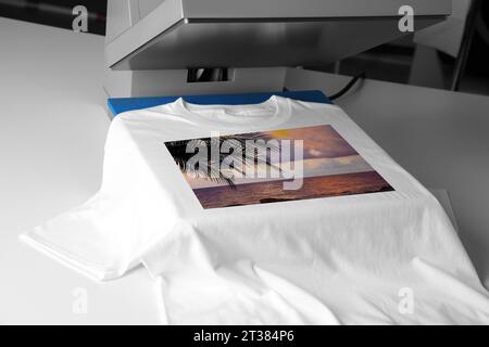 Custom t-shirt. Using heat press to print beautiful image of tropical seascape Stock Photo