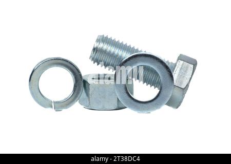 Full thread hexagon bolt and internal screw, flat nut washer and spring washer coated with a protective layer of zinc isolated on white background Stock Photo