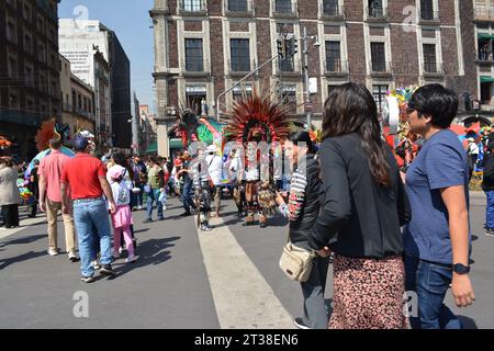 People of all ages gather in Mexico City for the Alebrijes parade on 2023-10-22. The excitement is palpable in the air as people wait for the parade Stock Photo