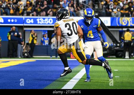 Commandres Running Back Pittsburgh Steelers running back Jaylen Warren #30 gets tackled during ...
