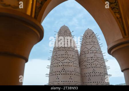 Doha, Qatar - December 9, 2022: Pigeon towers in Katara Cultural Village, Doha, Qatar. Stock Photo