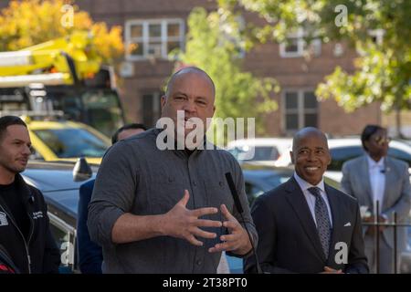 New York, New York, USA. 23rd Oct, 2023. (NEW) Mayor Adams Signs Bill Paving Way For Electrification Of All City Government Vehicles. October 23, 2023, New York, New York, USA: Sierra Club Executive Director Ben Jealous speaks during Intro. 279-A bill signing ceremony at NYCHA's Ravenswood Houses on October 23, 2003 in the Queens borough of New York City. Mayor Adams signs Intro. 279-A, formally codifying the city's goal of transitioning its automobile fleet to all Fully Electric (zero emissions) vehicles (ZEVs) by 2038. In addition, the city will install solar carports at Stock Photo