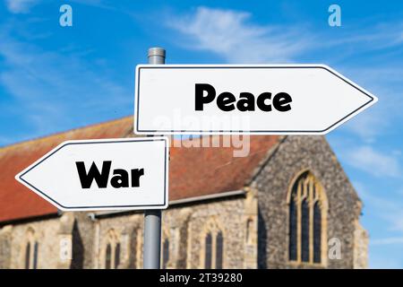 Road Sign concept of option of going to war or having peace Stock Photo