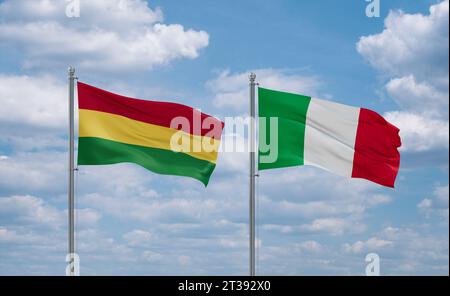 Italy and Bolivia flags waving together in the wind on blue cloudy sky, two country relationship concept Stock Photo