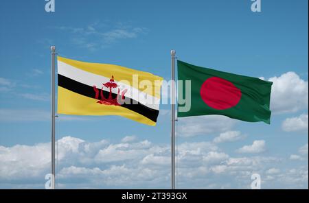 Bangladesh and Brunei flags waving together on blue cloudy sky, two country relationship concept Stock Photo