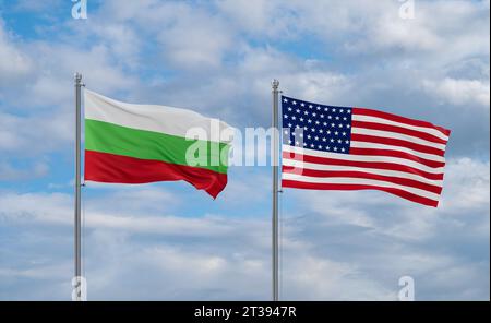 USA and Bulgaria flags waving together in the wind on blue cloudy sky, two country relationship concept Stock Photo