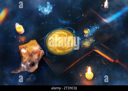 Alchemy, astronomy, astrology, a magic potion in a pot. mysticism, mysterious Stock Photo