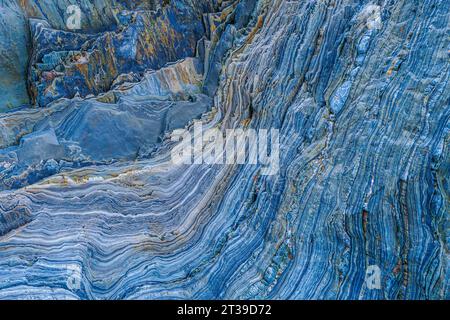 Closeup of textured surface of rough rocky formation as abstract background Stock Photo
