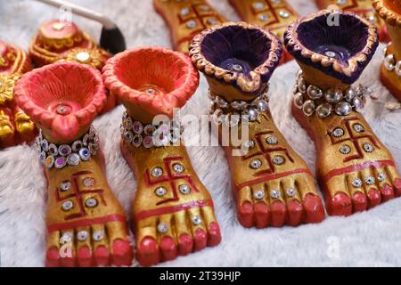 Clay lamp stall for festival celebration, Terracotta diyas or oil lamps for Diwali for sale at a market in India. Stock Photo