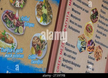 greek taverna menu advertising souvlaki, mousaka, chips, etc. Stock Photo