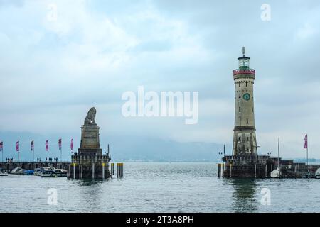 Harbour entrance featuring the Bavarian Lion and the Lighthouse, Lindau (Lake Constance), Bavaria, Germany. Stock Photo