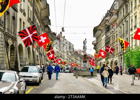 Bern-May 20 ,2023 :Old town view with tourists in Kramgasse street in Bern Switzerland Stock Photo