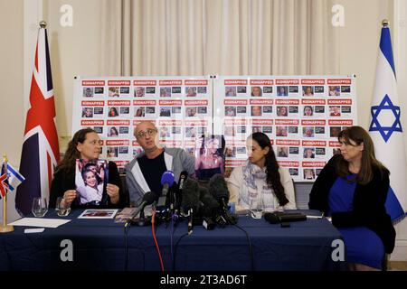 (left to right) British-Israeli Ayelet Svatitzky whose mother and brother were taken hostage from Kibbutz Nirim, British-Israeli David Barr whose sister-in-law Naomi was murdered on her morning run and British-Israeli Ofri Bibas Levy whose brother Jordan was taken hostage from his home in Nir Oz along with his wife Shiri and their children Ariel, four, and four-month-old Kfir during a press conference for the families of British-Israeli kidnap victims of the Israel-Hamas conflict, at the Israeli Embassy in London. Stock Photo