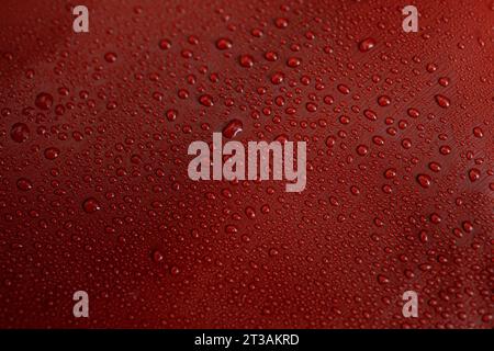 water drops on red brown leather texture, soft focus close up Stock Photo