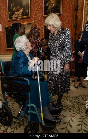 Queen Camilla with Mrs Agnes Packard during a reception for the Kenyan diaspora in the UK at Buckingham Palace, central London, to celebrate the warm relationship between the two countries and the strong and dynamic partnership they continue to forge ahead of her Majesty's state visit to Kenya. Picture date: Tuesday October 24, 2023. Stock Photo