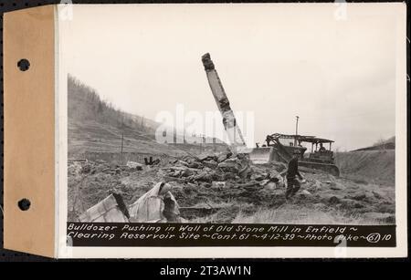 Contract No. 61, Clearing West Branch, Quabbin Reservoir, Belchertown, Pelham, Shutesbury, New Salem, Ware (including in areas of former towns of Enfield and Prescott), bulldozer pushing in wall of old stone mill in Enfield, Enfield, Mass., Apr. 12, 1939 Stock Photo