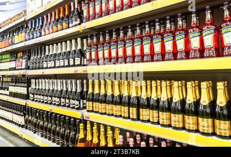 Samara, Russia - September 26, 2023: Various bottled alcoholic beverages. Different wines ready for sale in superstore. Bottled alcoholic sparkling be Stock Photo