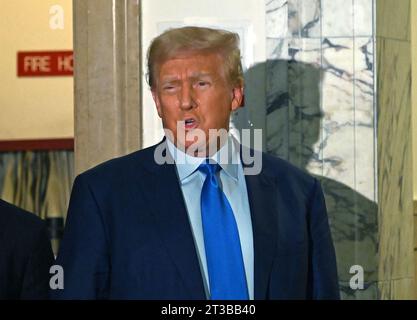 New York, United States. 21st Jan, 2020. Former United States President Donald Trump speaks outside the courtroom in the fourth week of his civil fraud trial at State Supreme Court on Tuesday, October 24, 2023 in New York City. The case brought last September by New York Attorney General Letitia James, accuses Trump, his eldest sons and his family business of inflating Trump's net worth by more than $2 billion by overvaluing his real estate portfolio. Photo by Louis Lanzano/UPI Credit: UPI/Alamy Live News Stock Photo