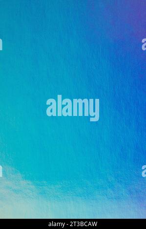 Light blue shiny metallic surface texture background close up view Stock Photo