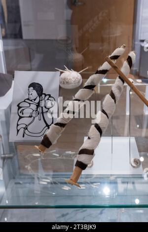 Canada, Nunavut, King William Island, Gjoa Haven. Nattlik Heritage Centre, interior. Traditional hair style display. Stock Photo